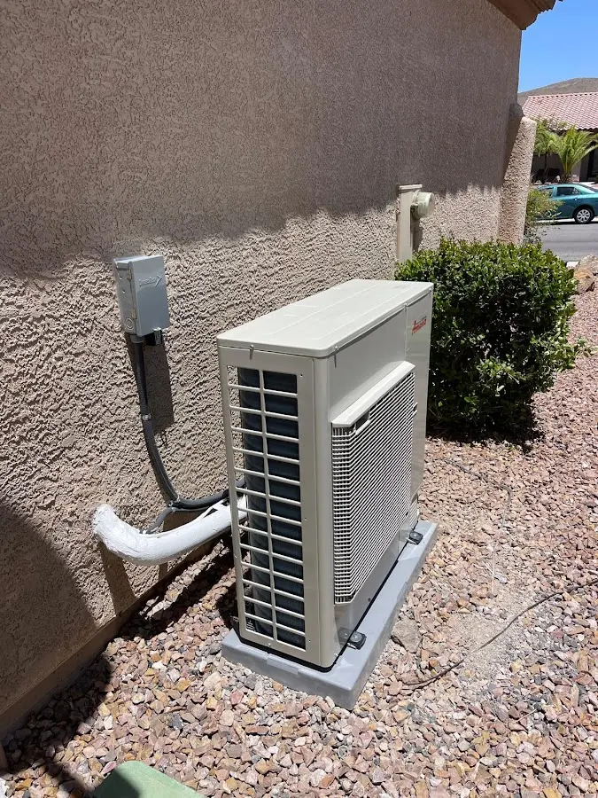 Residential air conditioning condenser unit in Southwick